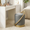 Round grey faux leather vanity stool with gold halo design, perfect for makeup rooms and bedrooms, offers stylish comfort.