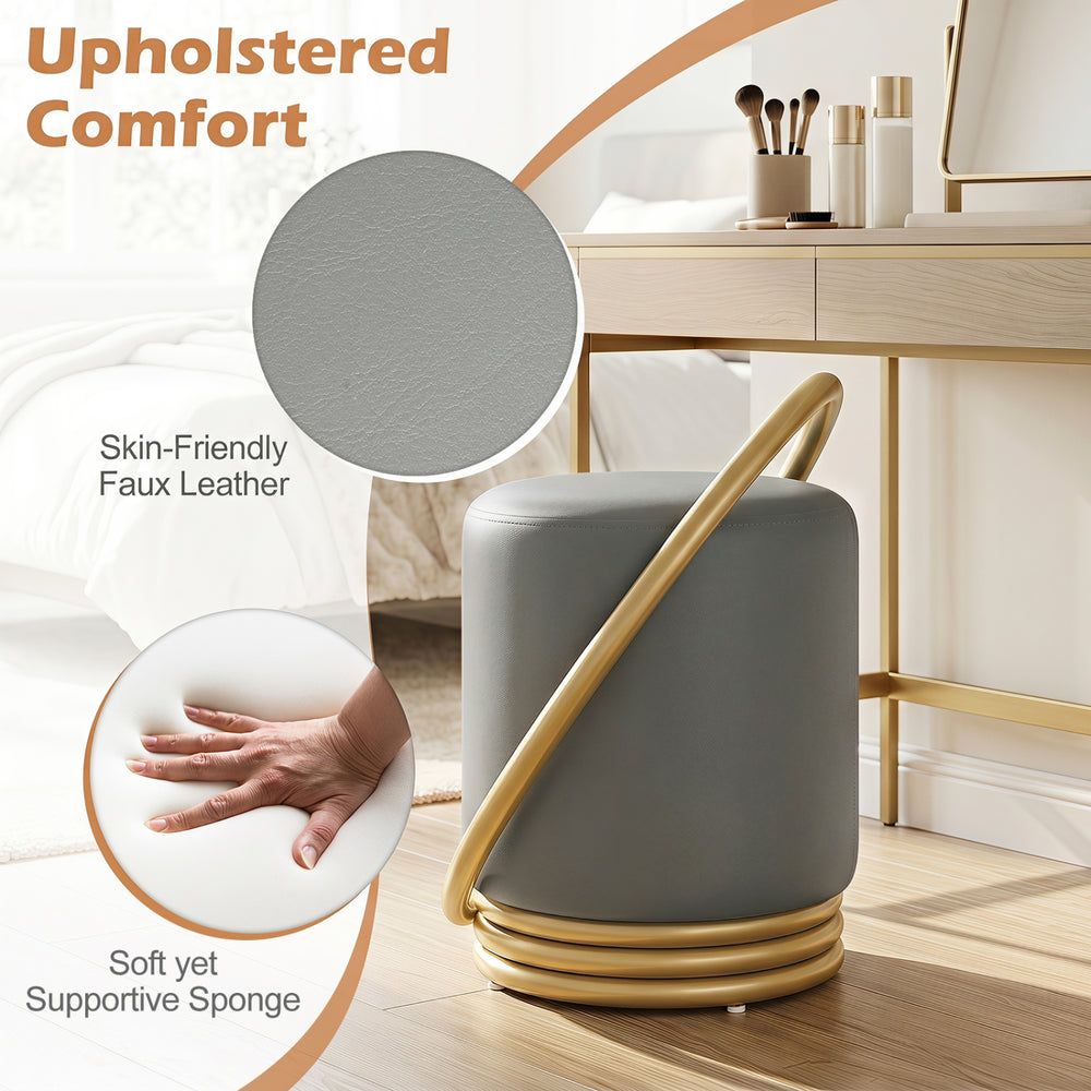 Round grey vanity stool with gold halo design, featuring faux leather upholstery and soft supportive sponge for comfort.