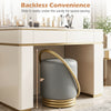 Round grey vanity stool with gold halo design, upholstered faux leather, perfect for makeup rooms and space-saving.