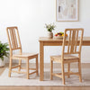 Natural rubber wood dining chairs set of 2 with ergonomic hollowed backrest, perfect for dining room comfort.