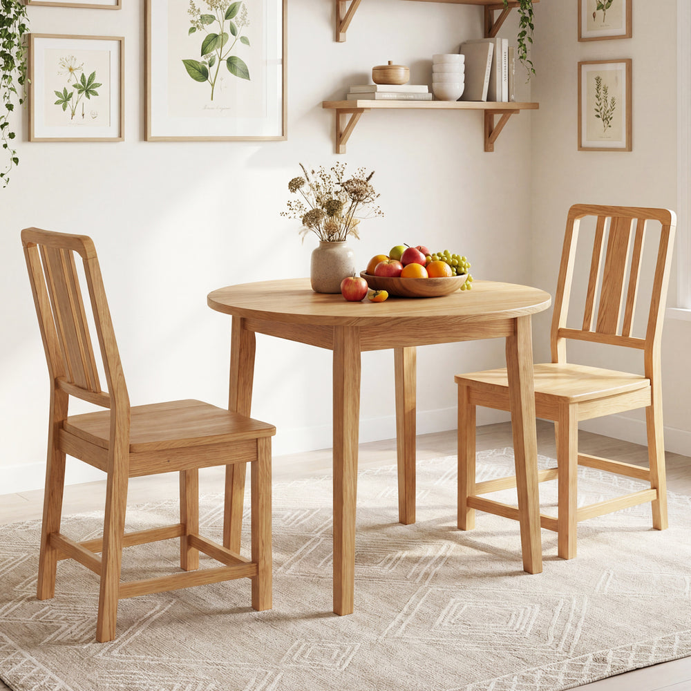 Natural rubber wood dining chairs set of 2 with ergonomic backrest, placed around a round dining table for cozy dining.