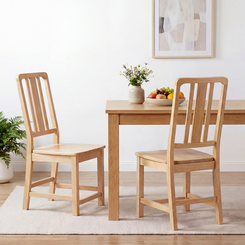 Natural rubber wood dining chairs with hollowed backrest, showcasing ergonomic design and stability for dining comfort.