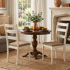 White rubber wood dining chairs with padded linen seats and slatted backrests, perfect for dining or living room use.