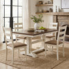 Set of four white rubber wood dining chairs with padded linen seats and slatted backrests for comfortable seating.