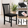Black wooden dining chair with slat backrest, ergonomic tilt design, perfect for kitchen or dining room use.