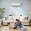Mini split heat pump in a living room, providing efficient heating and cooling with remote control and adjustable.