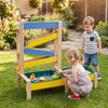 Montessori sensory play table with two water basins, fir wood frame, and toys for outdoor fun for toddlers.