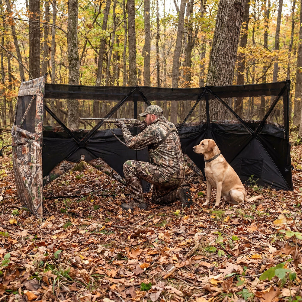 See-through hunting blind panel with camouflage pattern, featuring adjustable windows and dog door for enhanced hunting.