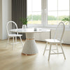 Vintage white Windsor dining chairs with spindle back, ergonomic design for comfort, perfect for dining room use.