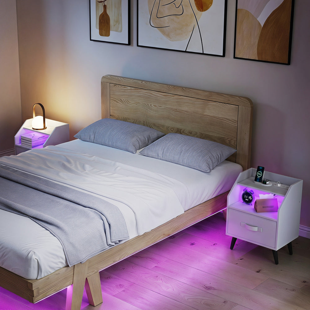 Set of 2 white nightstands with LED lights, power outlets, and foldable drawers for stylish and functional bedroom storage.