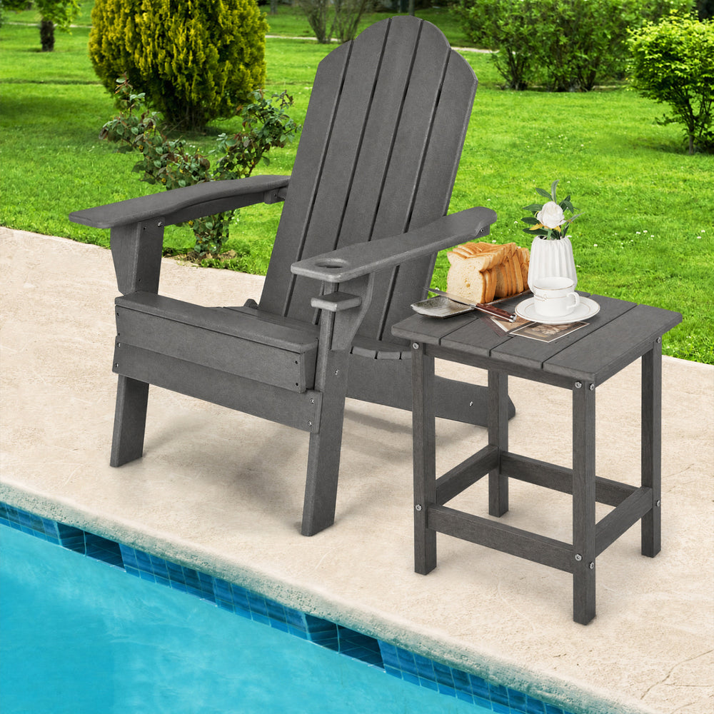 Gray weather-resistant Adirondack side table with slatted top, perfect for outdoor use by the pool or patio.