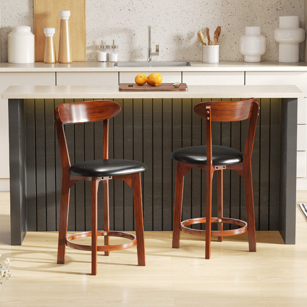 Set of 2 modern armless dining chairs with cushioned seats, made from solid rubber wood, perfect for kitchen islands.