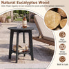 Black 2-tier outdoor eucalyptus wood side table features a slatted tabletop and storage shelf, perfect for backyard use.