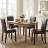 Faux leather upholstered dining chairs with solid wood legs and nailhead accents, perfect for kitchen or dining areas.