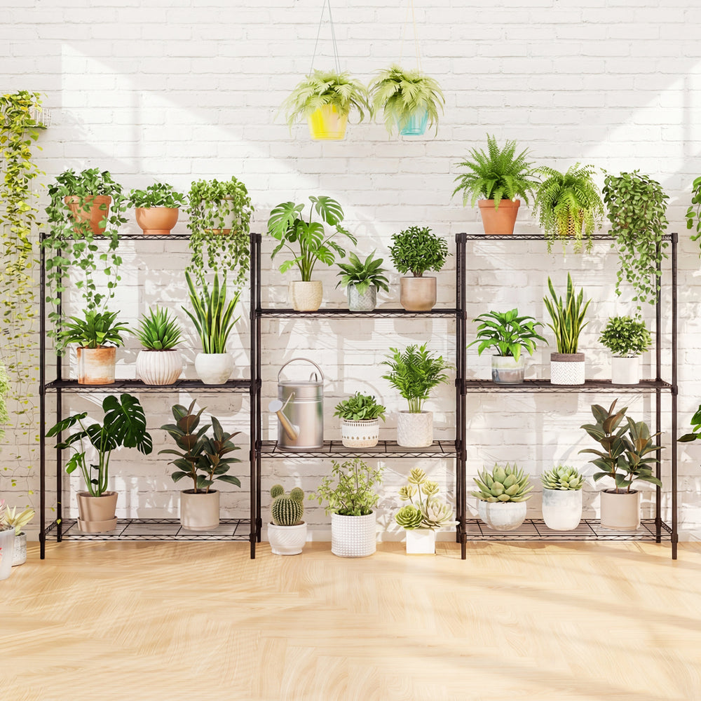 4-tier black metal shelving unit displaying various potted plants, ideal for indoor storage and organization.
