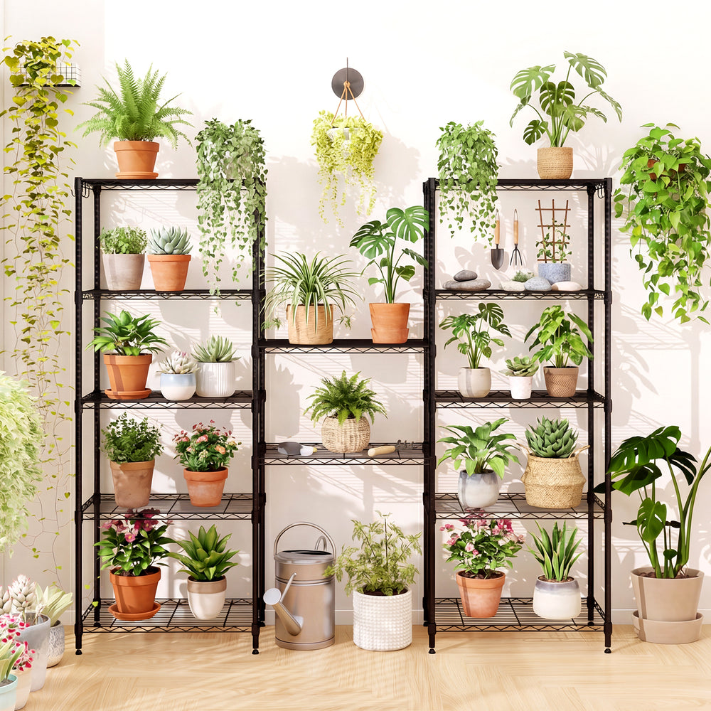 6-tier black metal shelving unit displaying various potted plants, ideal for organizing kitchen or garage spaces.