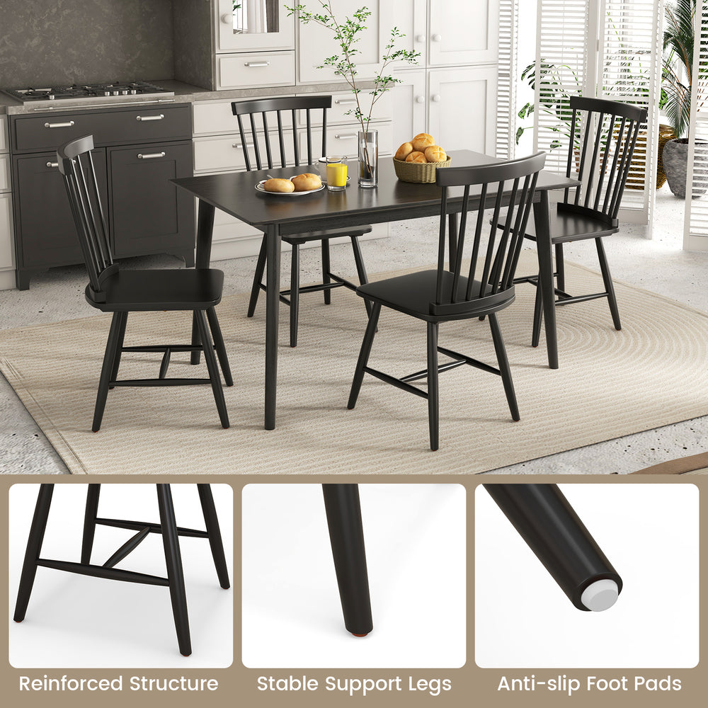 Black Windsor dining chair set featuring a high spindle back, sturdy rubber wood frame, and non-slip foot pads for.