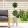 Artificial double topiary ball trees with vivid leaves in a cement-filled pot, perfect for outdoor decoration.