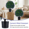 Artificial lavender topiary ball tree in a cement-filled pot, perfect for adding vibrant color to any indoor space.