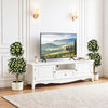 Two artificial topiary trees with white blossoms in weighted pots, perfect for enhancing living spaces or events.