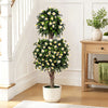 Two artificial topiary trees with white blossoms in weighted pots, perfect for enhancing home decor without maintenance.