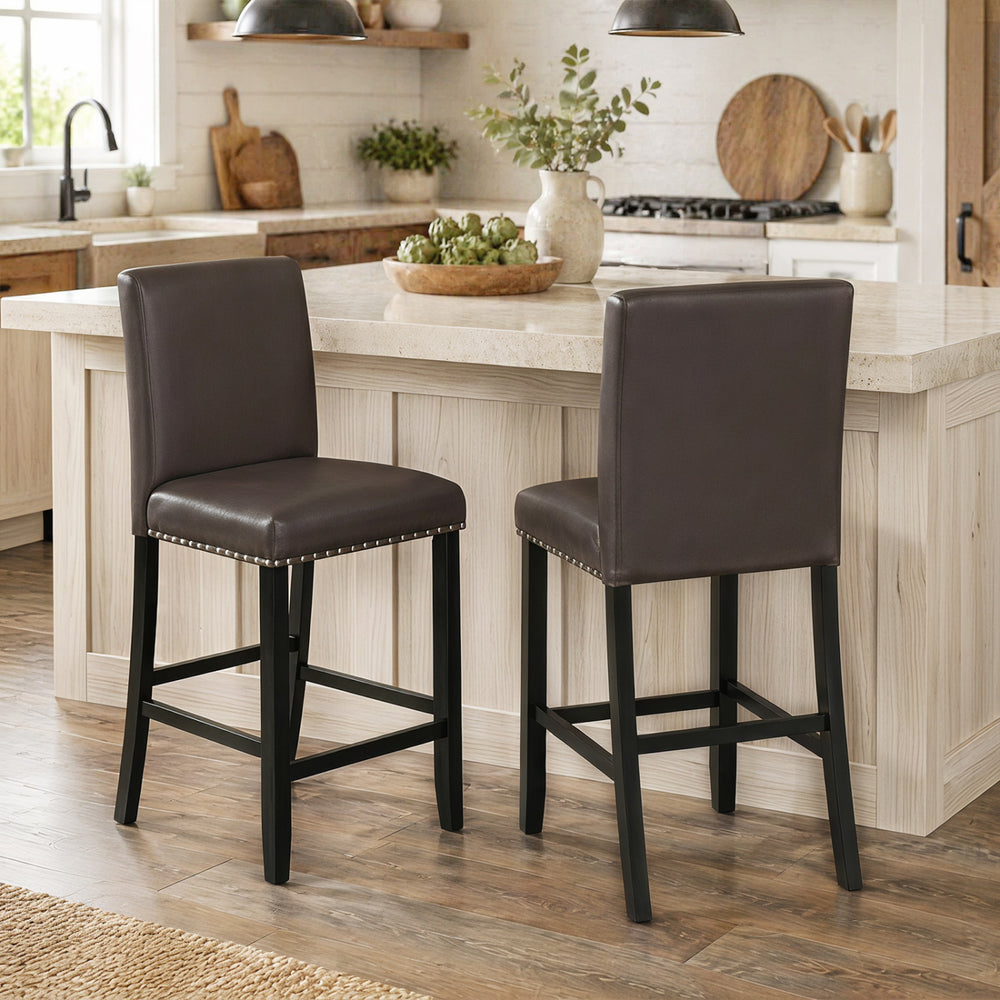 Set of 2 brown bar stools with backrest, padded seat, and protective non-slip pads for kitchen island comfort.