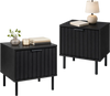 Black modern nightstand set featuring vertical-striped storage drawers and a compact design for space-saving bedside use.