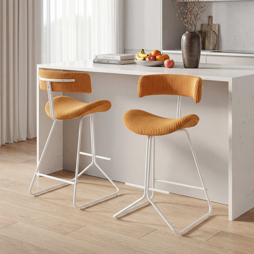 Set of 2 orange counter height stools with padded seats, curved backs, and stable metal bases for kitchen counters.