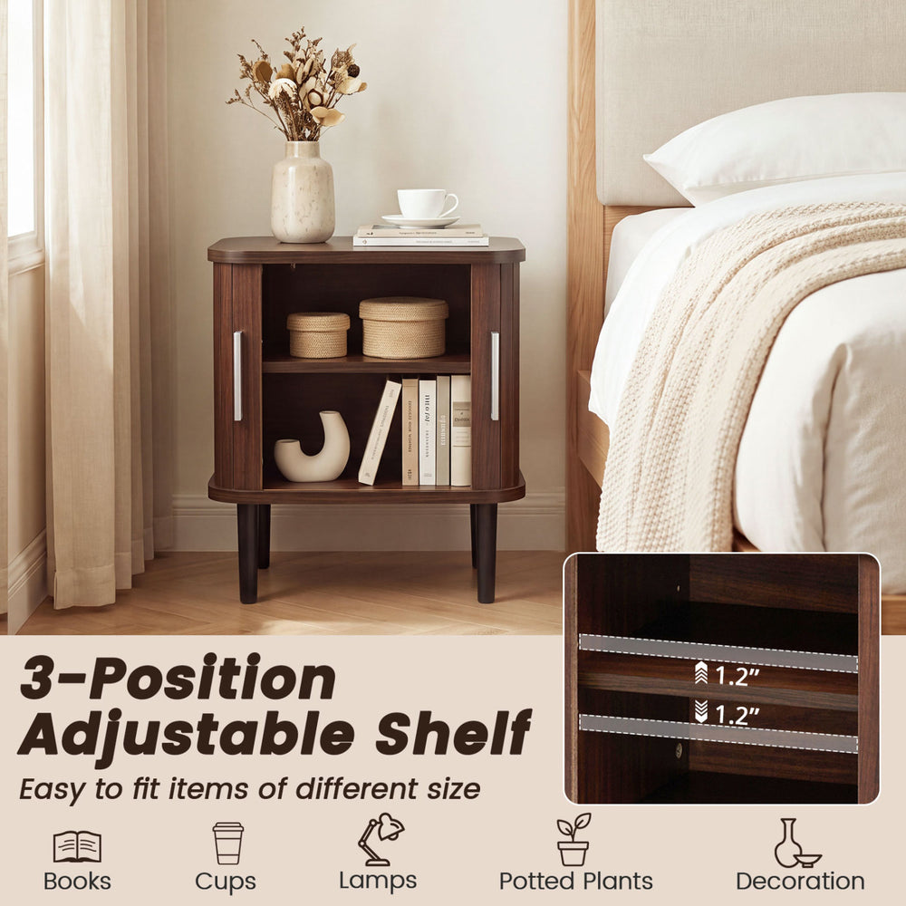Fluted nightstand with sliding doors and adjustable shelf in walnut, perfect for small spaces and bedside essentials.