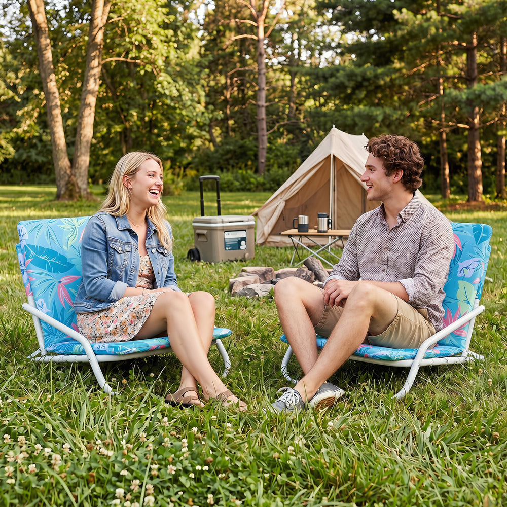 Set of 2 folding beach chairs with sponge padded seats, vibrant colors, perfect for camping and outdoor gatherings.