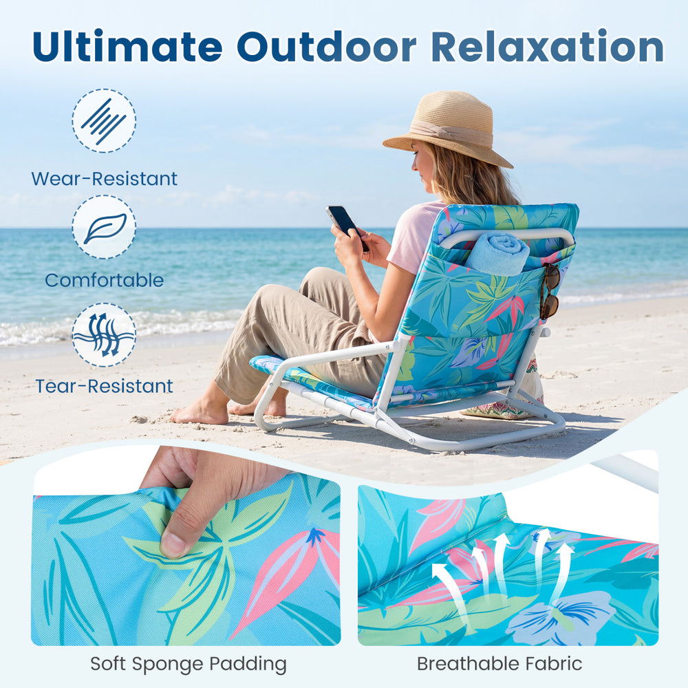 Folding beach chair features soft sponge padding and breathable fabric, ideal for camping and outdoor relaxation.