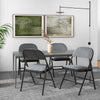 Folding chair set with upholstered seats and fabric-covered backrests, perfect for dining or meeting rooms.