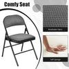 Folding chair with upholstered seat and fabric backrest, featuring anti-slip foot pads for stability and comfort.