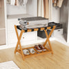 Folding luggage rack in solid acacia wood with 5 nylon straps and slatted shelf, perfect for organizing shoes and bags.