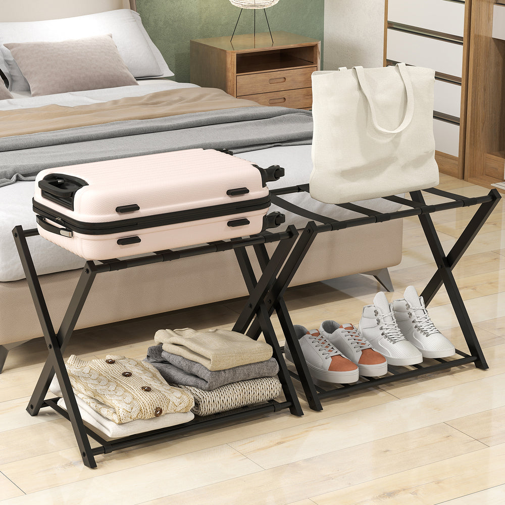 Folding metal luggage rack set in black with suitcase, shoes, and bags, ideal for bedroom or hotel storage.