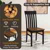 Black kitchen dining chair with slatted high backrest, made of solid rubber wood for durability and comfort.