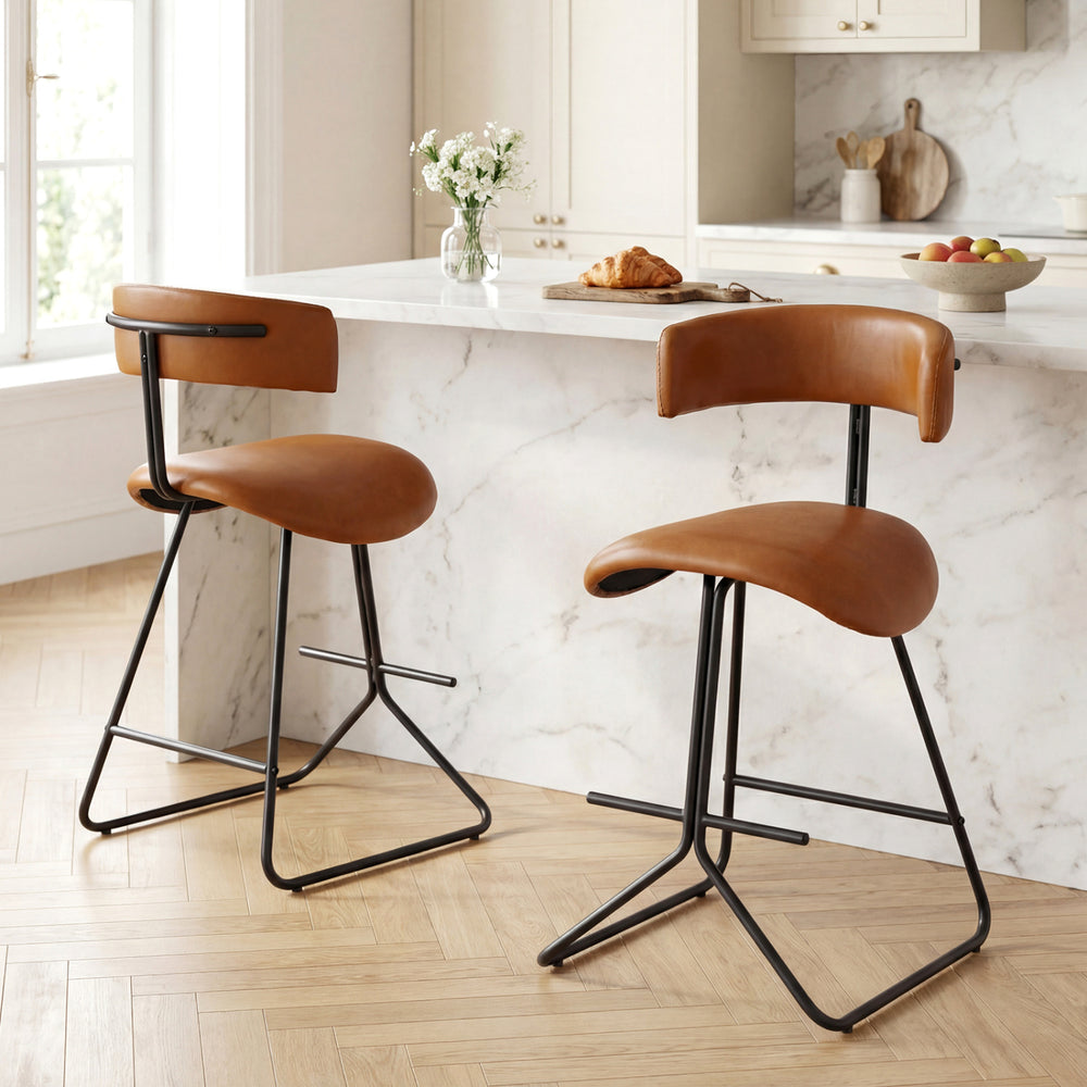 Set of 2 modern counter height stools with espresso faux leather upholstery and sleek metal base, ideal for kitchen.