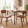 Set of 2 modern dining chairs with brown PU leather seats, ergonomic backs, and solid metal legs for stylish dining.