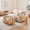 Nesting coffee tables with natural wood and rattan accents, featuring tempered glass tops for stylish living room.