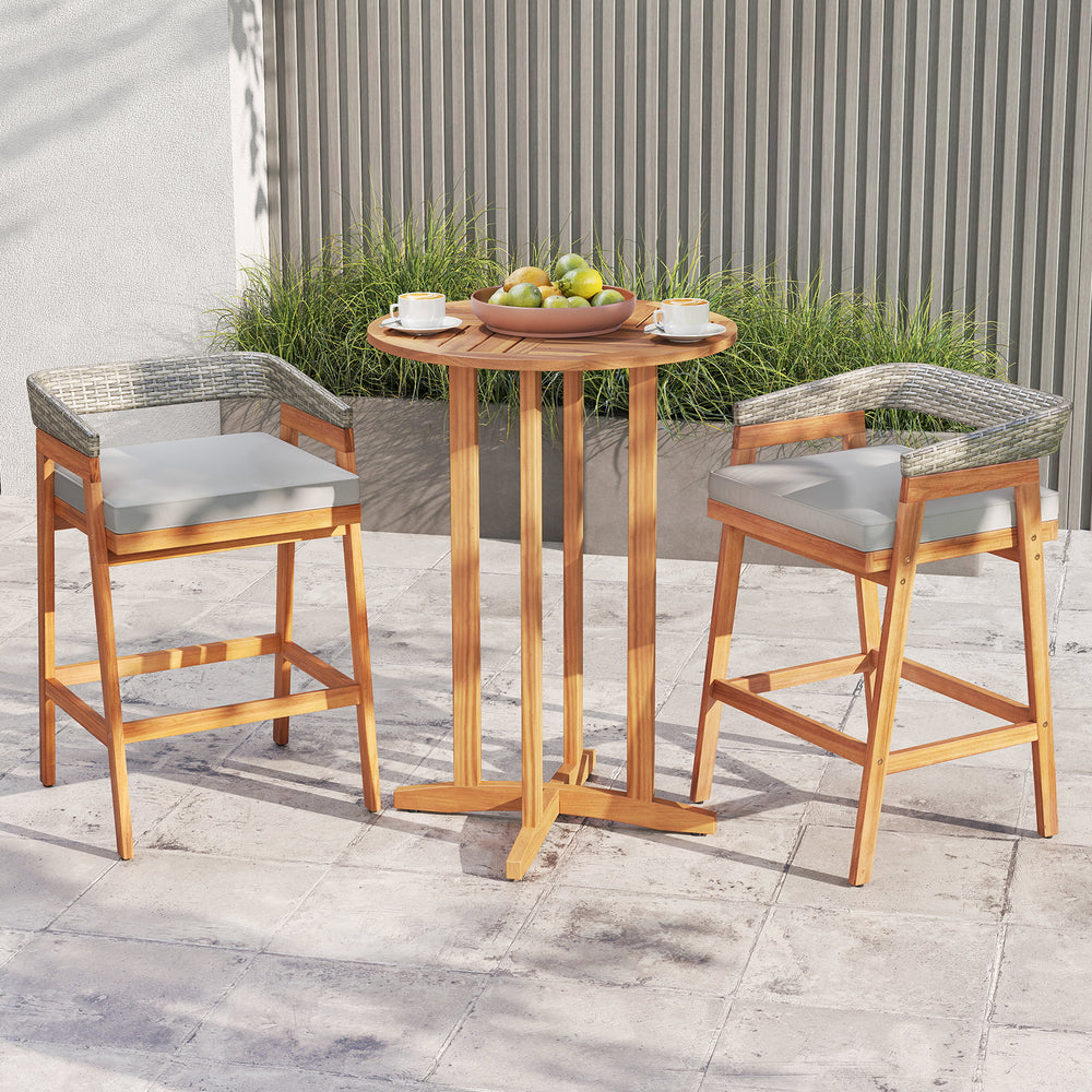 Set of 2 acacia wood counter height bar stools with gray cushions and PE wicker backrests, perfect for patio dining.