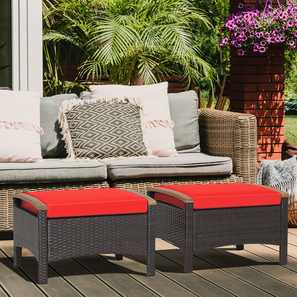 Set of 2 red fade-resistant wicker patio ottomans with soft cushions, perfect for outdoor seating or side tables.