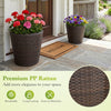 Set of 2 brown tapered plastic rattan planters with drainage holes, suitable for indoor and outdoor use.
