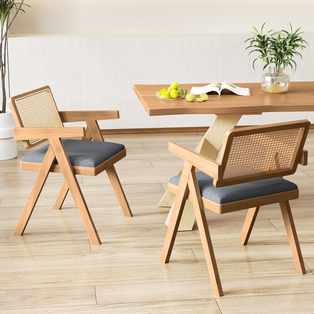 Side view of a rattan accent chair with gray padded cushion and rubber wood frame, ideal for stylish and comfortable.