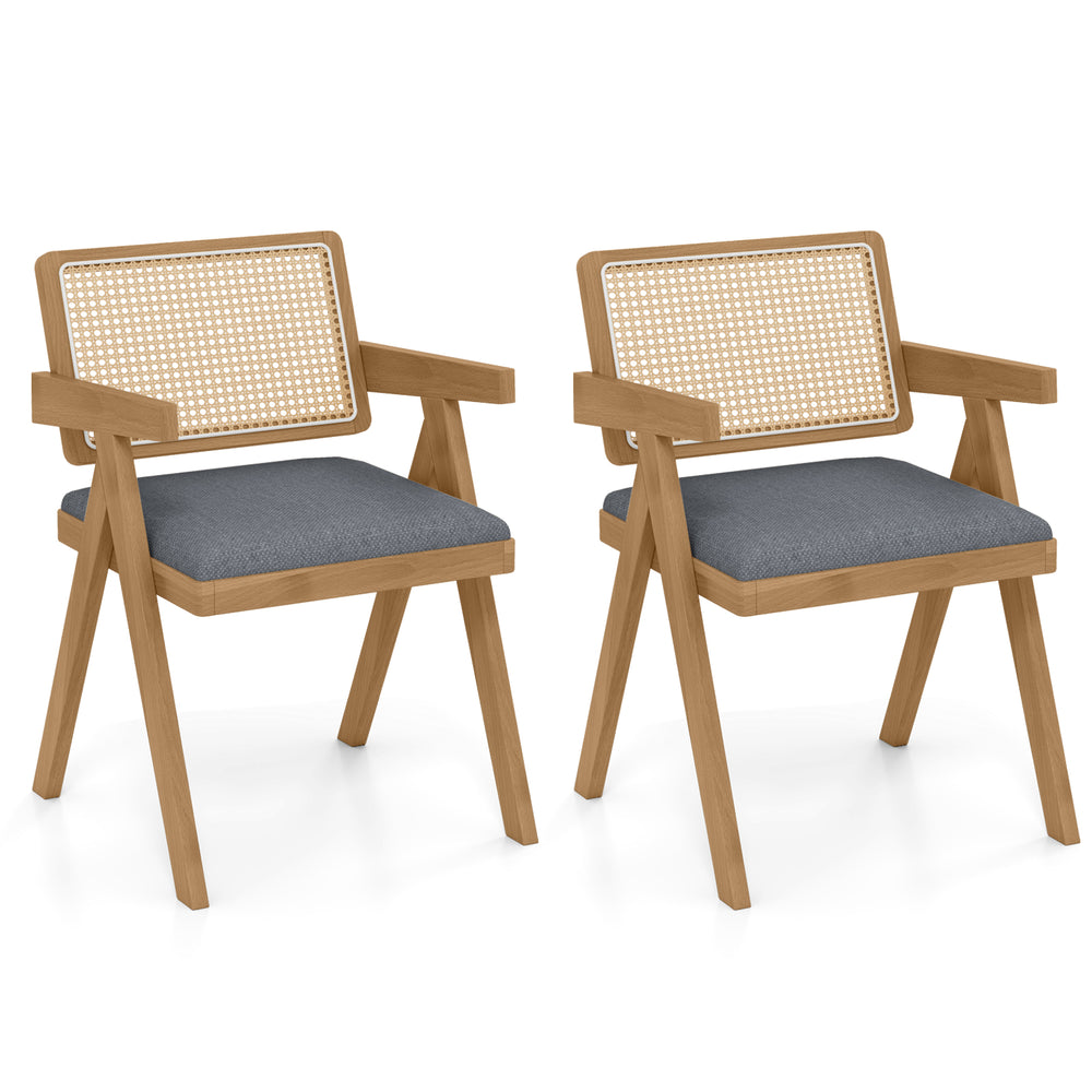 Set of 2 gray rattan accent chairs with padded cushions and rubber wood frame, ideal for dining or living room decor.