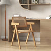 Natural bamboo frame accent chair with cozy backrest and armrest, ideal for dining or living room use.