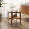 Round side end table with tempered glass top, acacia wood legs, and PE rattan, perfect for living room or bedroom use.