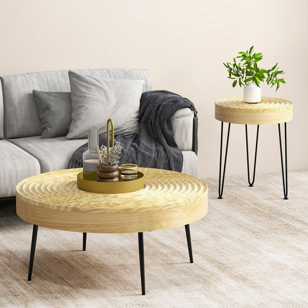 Round coffee tables set in natural solid pine wood with unique ripple patterns, perfect for living room or bedroom use.