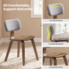 Rubber wood dining chair with teddy velvet padded backrest, featuring a contoured seat and curved surface for comfort.