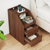 Walnut side end table with charging station, two drawers, and open compartment for organized storage beside a sofa.