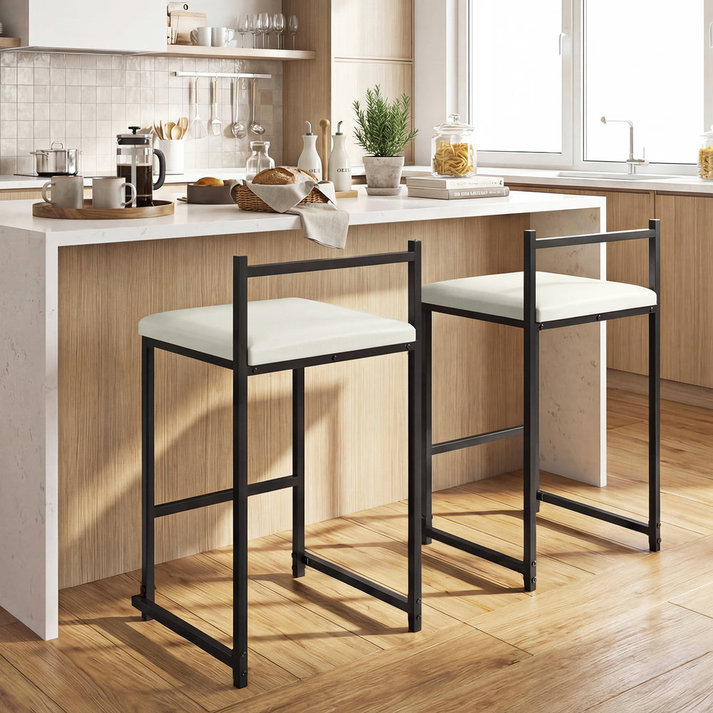 Set of 2 stackable counter height bar stools with black PU leather upholstery and footrest, ideal for kitchen islands.